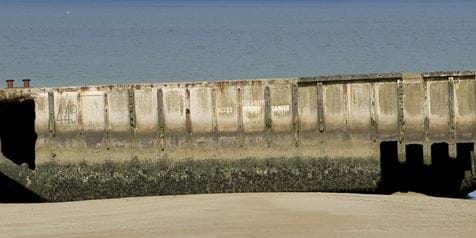Mulberry Harbour on beach in Normandy